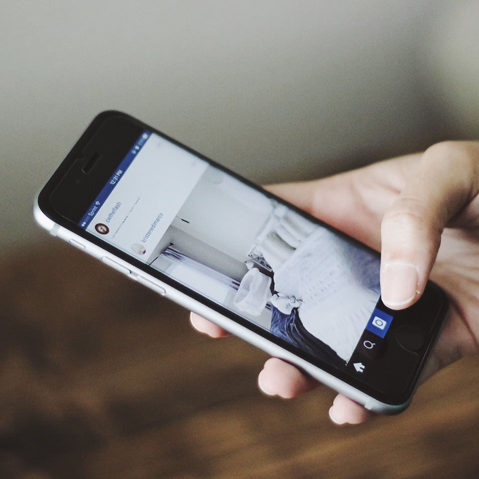 Hand holding a smartphone